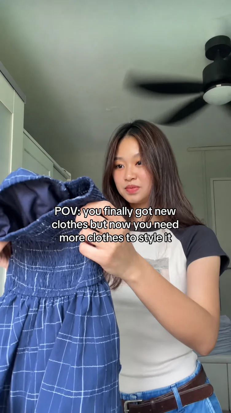 A creator showing off a new outfit in a viral short-form video.